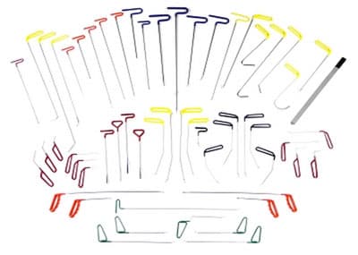 Professional paintless dent repair tools laid out as used in hands-on reconditioning training